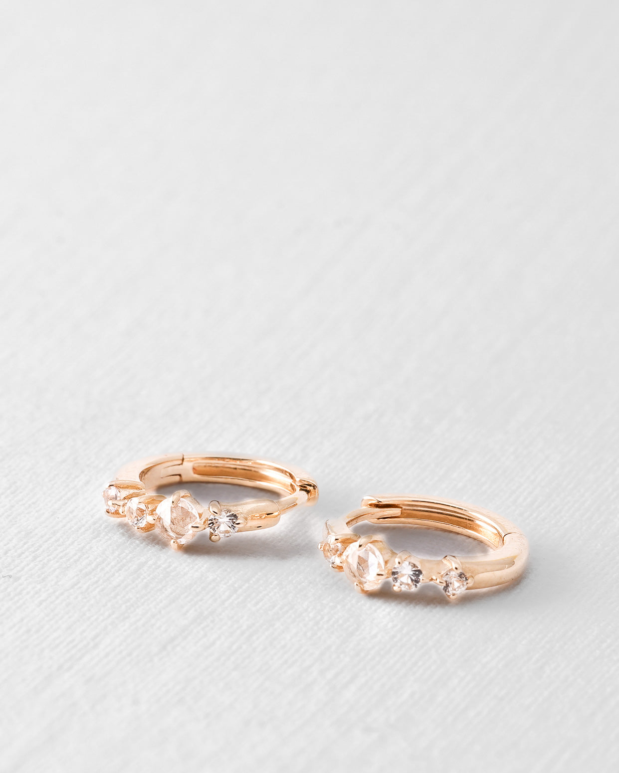 Elisa | 14K White Sapphire Huggies